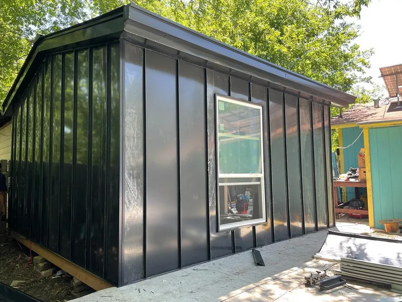 Black standing seam metal wall panels for Roof Inspection in McKeesport